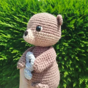 Loutre avec son poisson