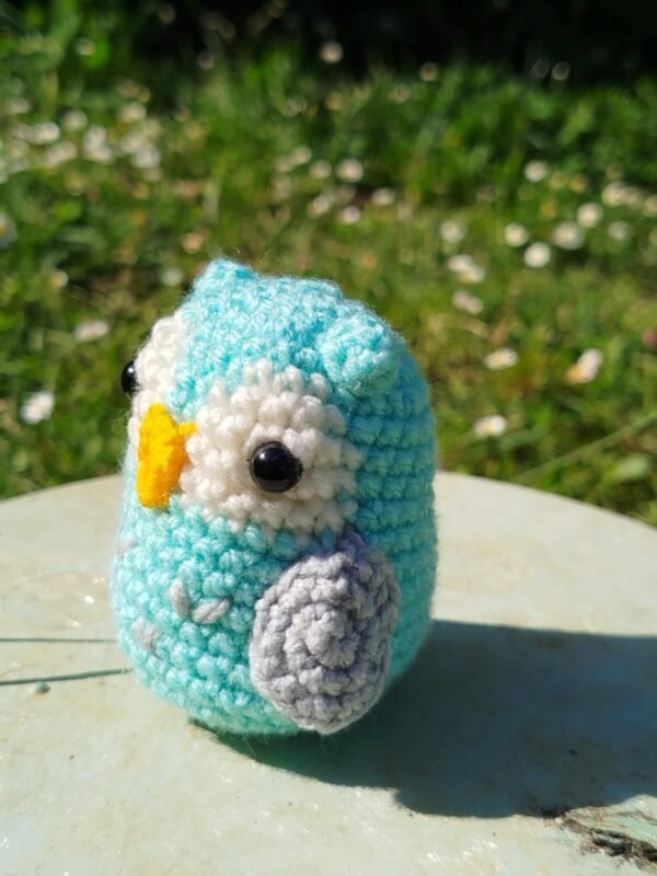 hibou au crochet de profil